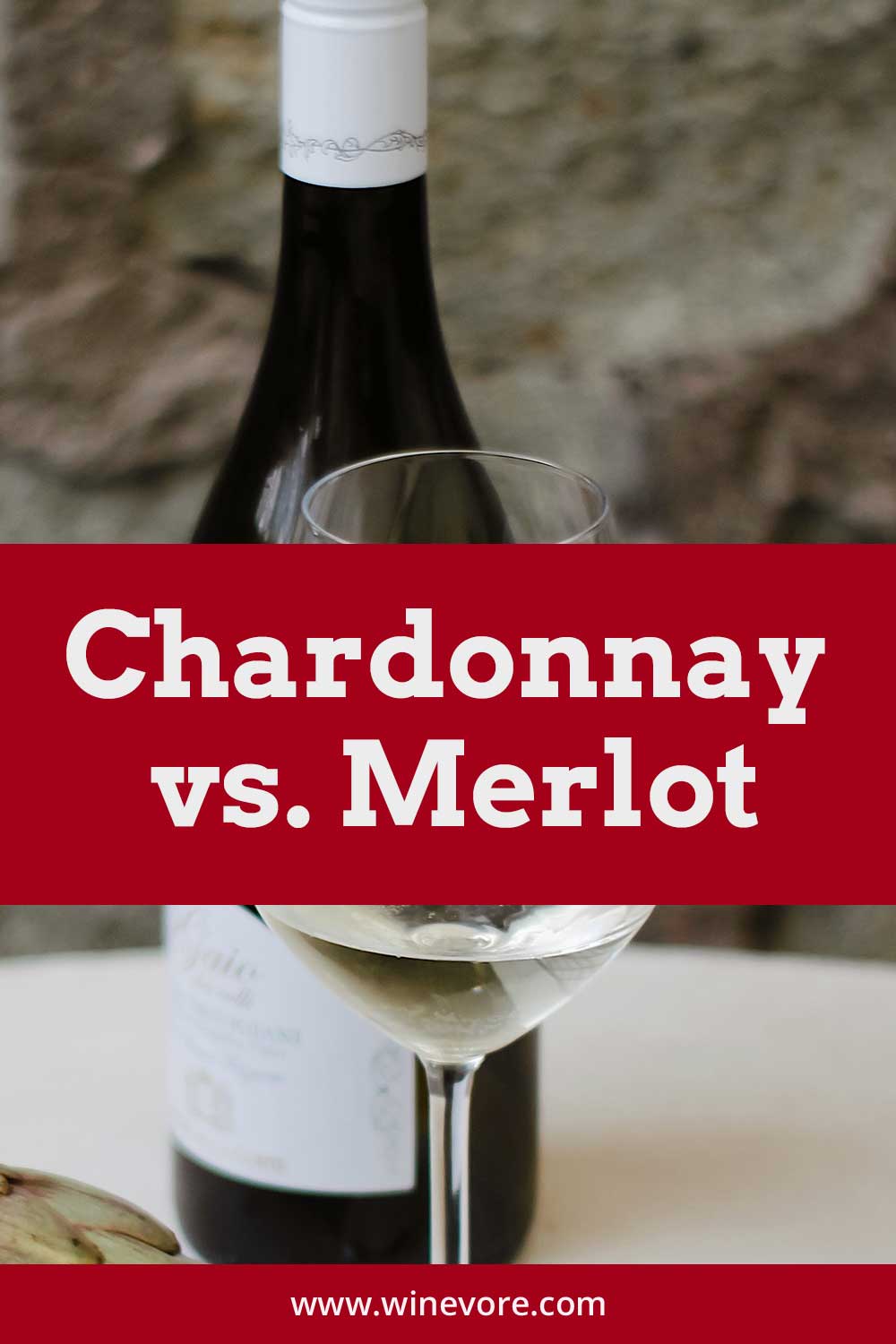 Glass of white wine with a wine bottle on a table - Chardonnay vs. Merlot.