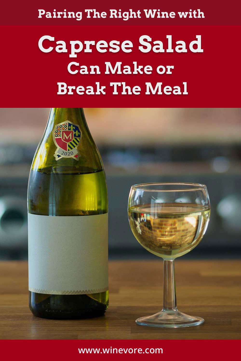 Wine bottle and glass on a wooden surface - Pairing The Right Wine with Caprese Salad.