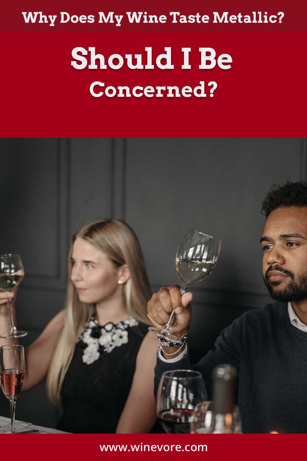 Man and woman holding wine glasses in front of their faces - Why Does My Wine Taste Metallic?