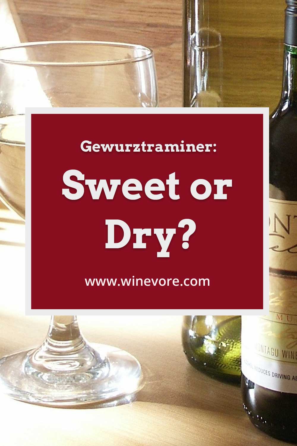 White wine glass and bottles on wooden surface - Gewurztraminer: Sweet or Dry?