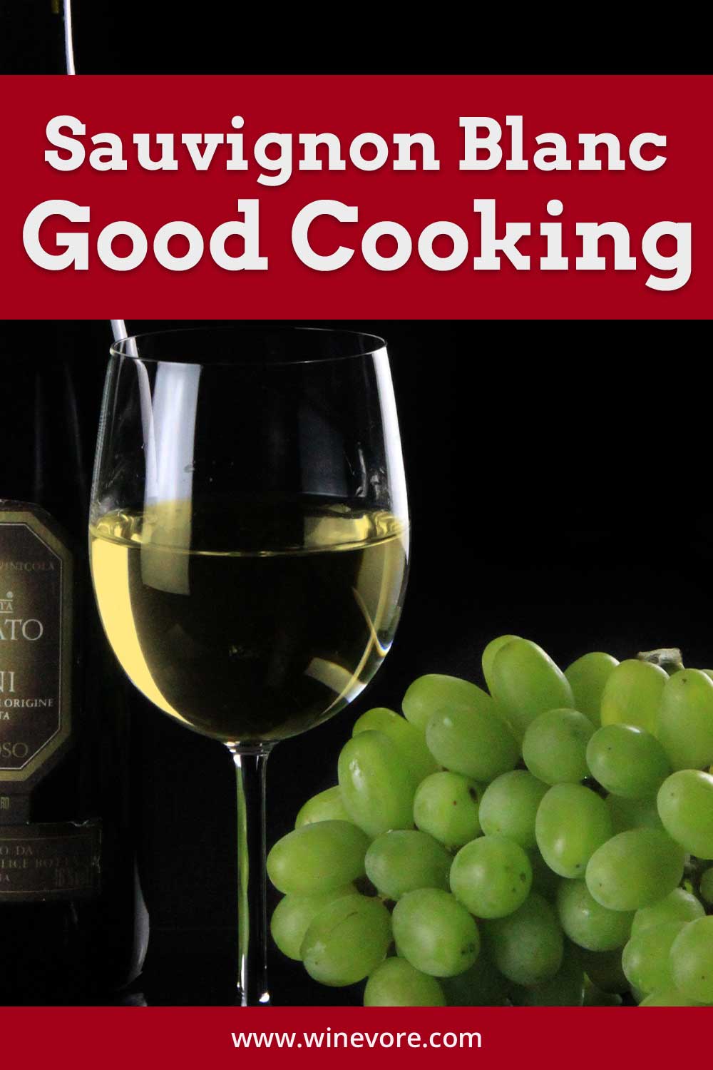 A glass of wine and ripe grapes in front of a dark bottle- Sauvignon Blanc Good Cooking.
