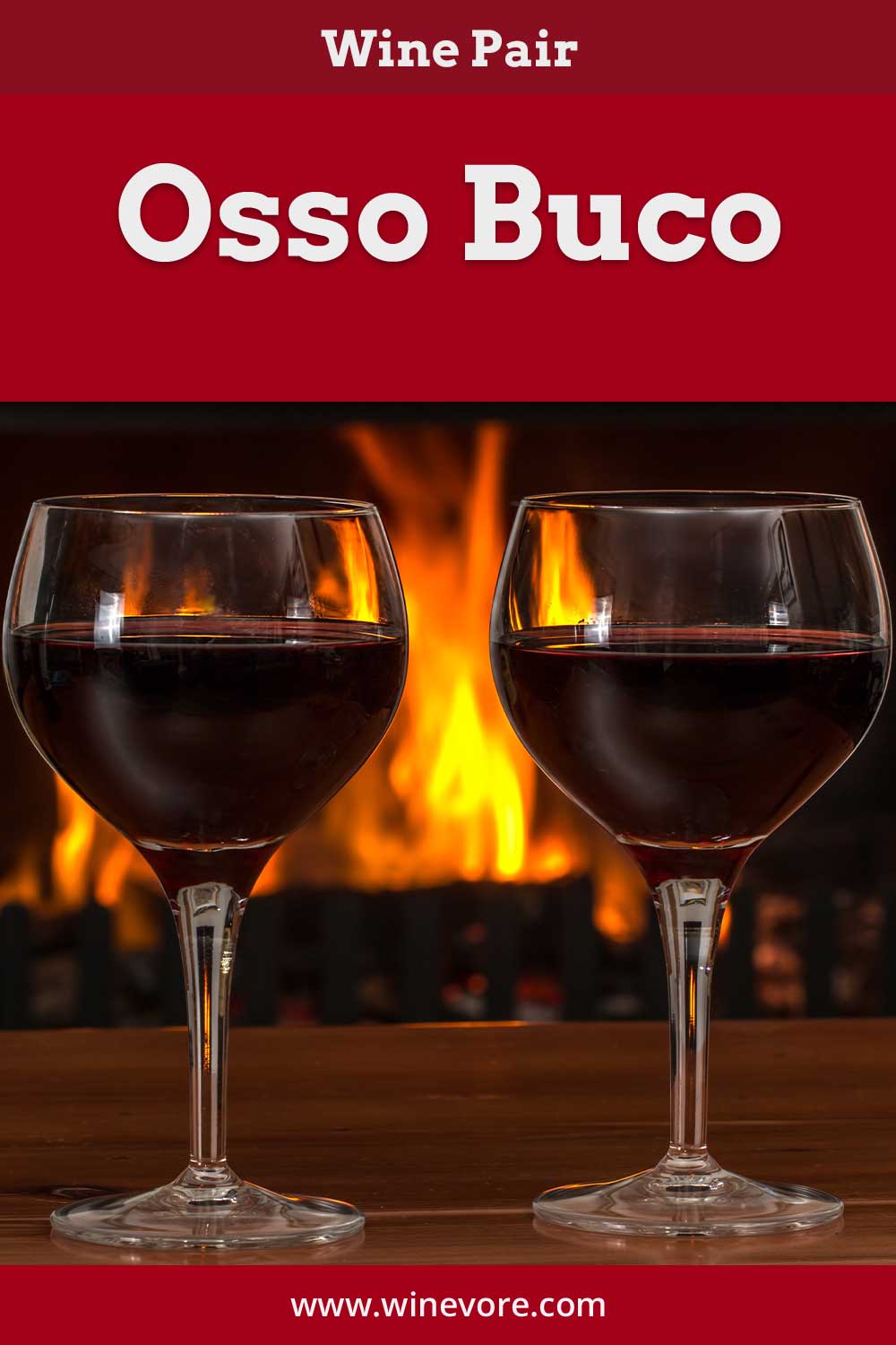 Two wine glasses in front of a fireplace - Wine Pair Osso Buco.