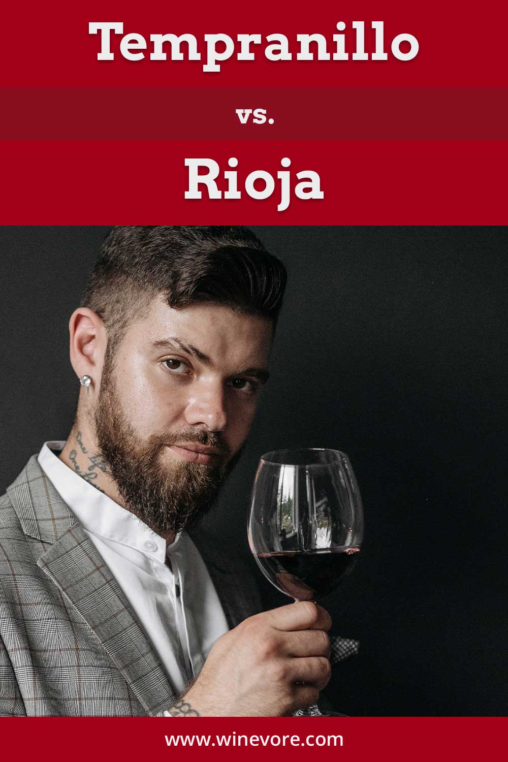 Man with a wine glass in hand - Tempranillo vs. Rioja.
