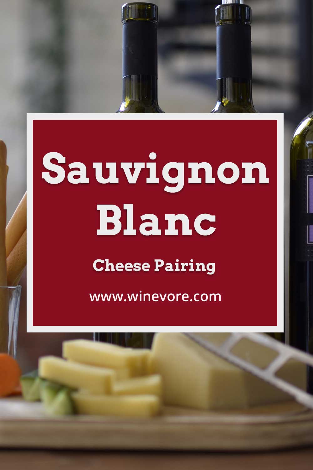 Slice cheese in front of wine bottle - Sauvignon Blanc Cheese Pairing.