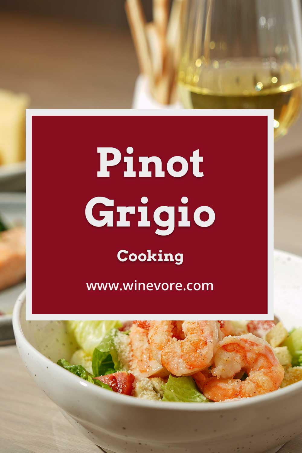 Cooked prawn in a small white bowl with a wine glass behind it - Pinot Grigio Cooking.